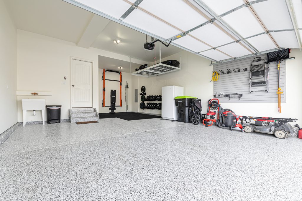PRO Garage Renovations - PRx Garage Gym with custom storage and epoxy floors- Serving Huntsville and surrounding areas