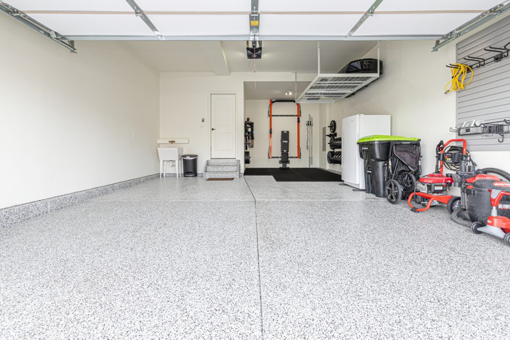 PRO Garage Renovations - PRx Garage Gym with custom storage and epoxy floors- Serving Huntsville and surrounding areas